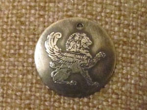 украшение лев